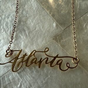 Atlanta Gold Tone Script Necklace